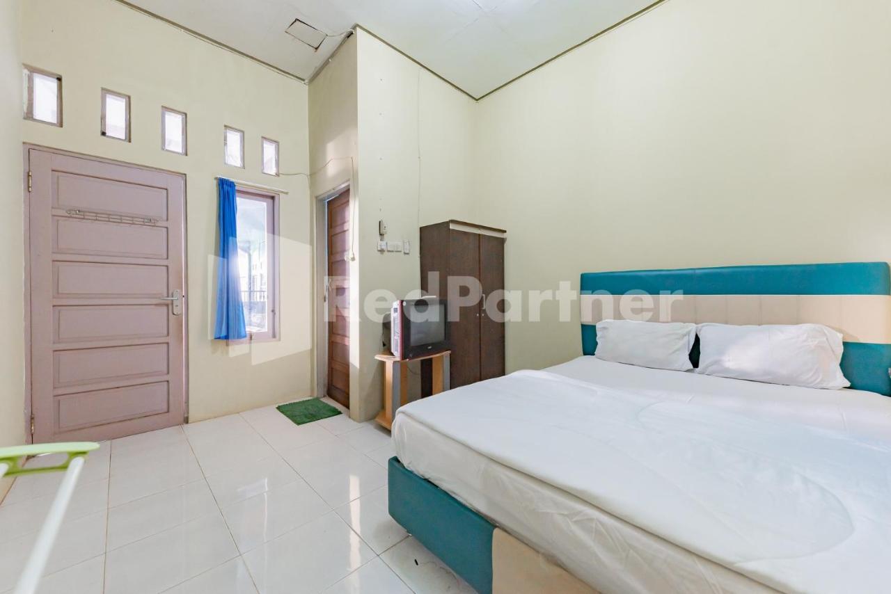 Ana Guest House Syariah Mitra Reddoorz バンジャルバル エクステリア 写真