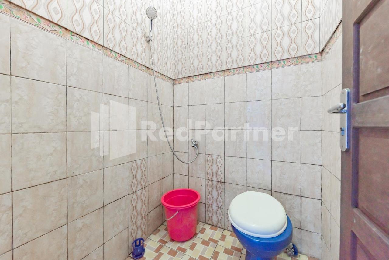 Ana Guest House Syariah Mitra Reddoorz バンジャルバル エクステリア 写真